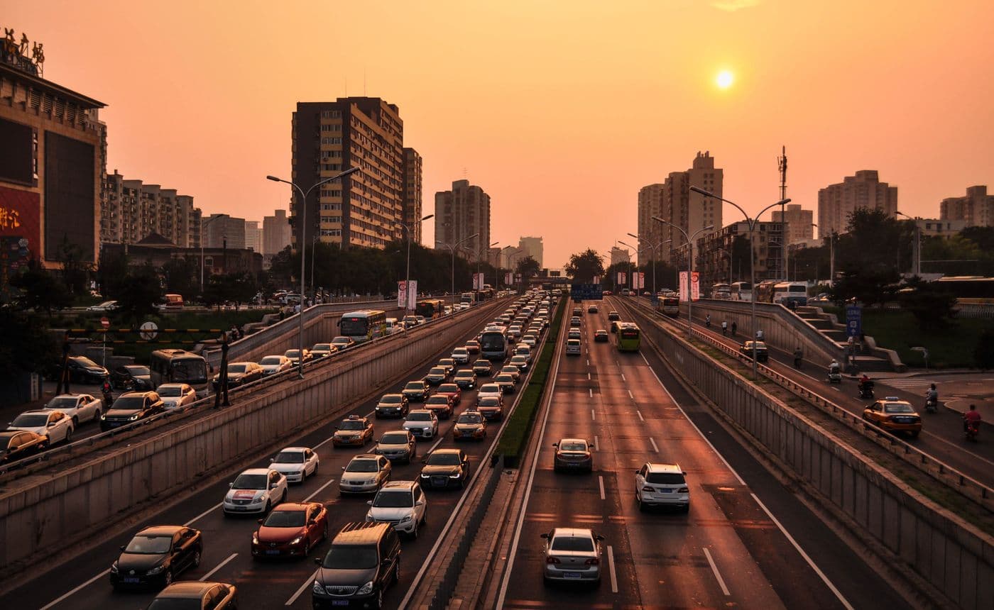 Highway traffic at dusk for long-distance and outstation taxi travel
